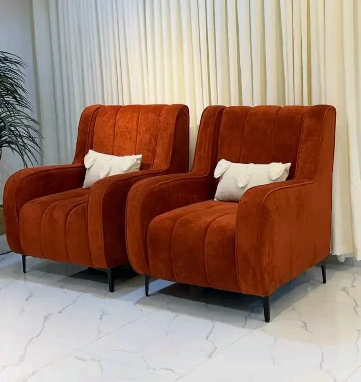 Rust upholstered armchairs