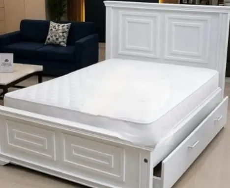 White upholstered bed
